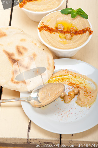 Image of Hummus with pita bread 