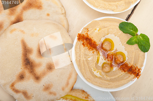 Image of Hummus with pita bread 