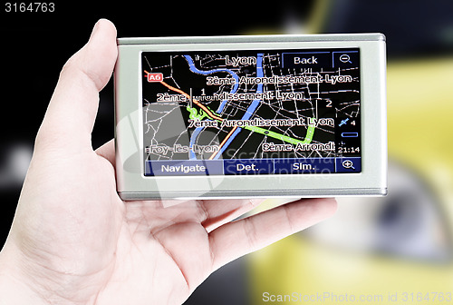 Image of Gps in a man hand.