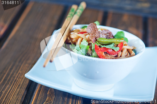 Image of noodles with meat