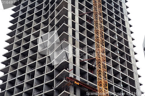 Image of Construction of a tall modern office building