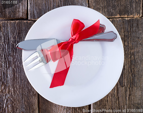 Image of fork and knife on a table