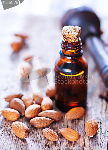 Image of almond oil in a glass bottle