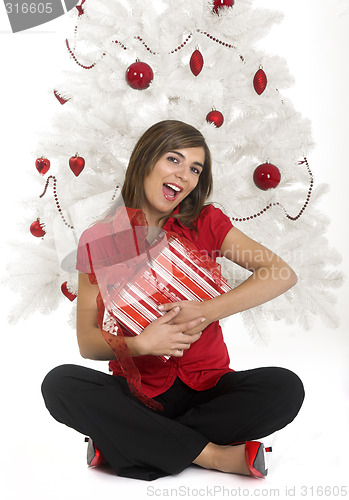 Image of Happy woman with Chirstmas gifts