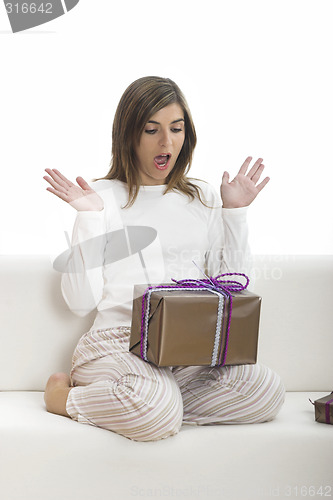 Image of Happy woman with gifts