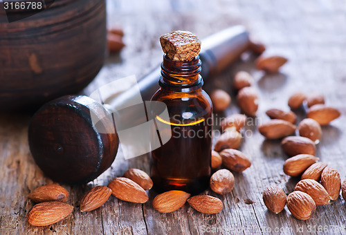 Image of almond oil in a glass bottle