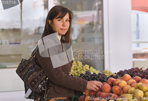 Image of Woman buying fruits