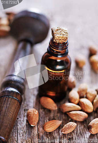 Image of almond oil in a glass bottle