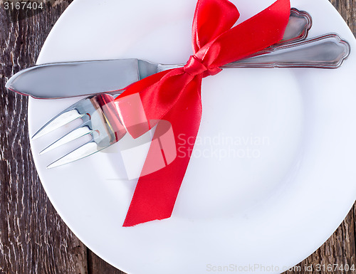 Image of fork and knife on a table