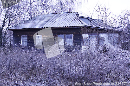 Image of Old rural house covered by hoarfrost