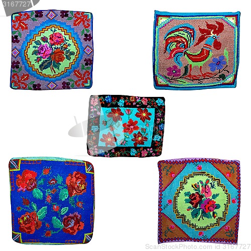 Image of five embroidered cushions