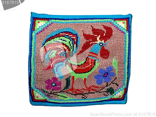 Image of pillow embroidered with a rooster