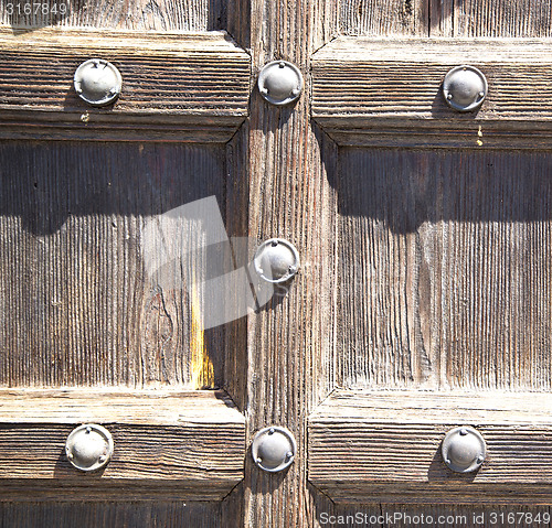 Image of jerago abstract   rusty brass brow  wood italy  lombardy 