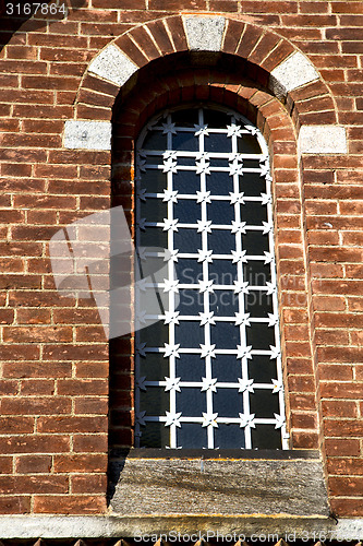 Image of rose window  italy  lombardy     in  the legnano old   church   