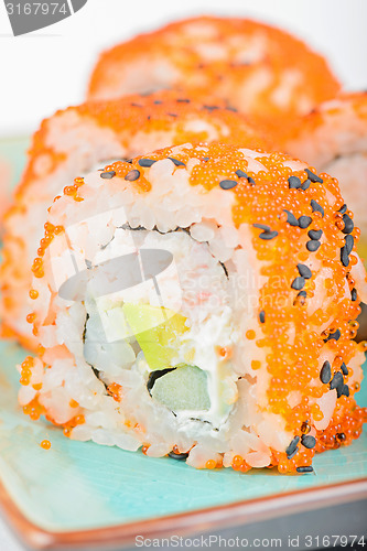 Image of Closeup California maki sushi with masago