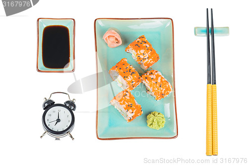 Image of Sushi rolls. Top view. Time to eat concept.