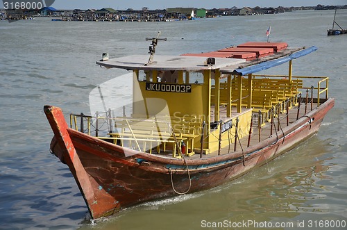 Image of Fish boat sails in the fish village