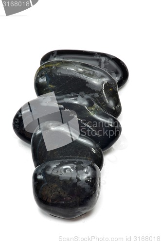Image of Stack of black stones  
