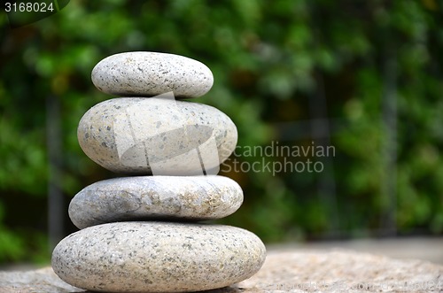 Image of Stack of zen rocks in garden