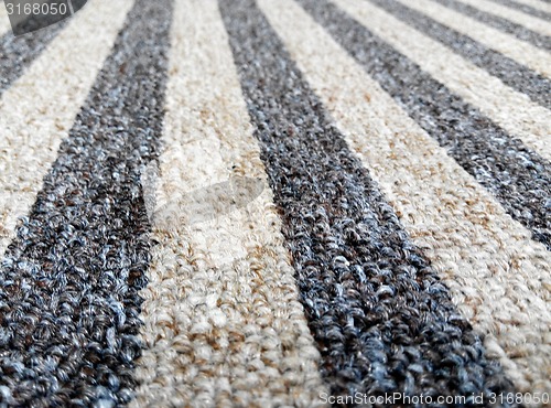 Image of Blue and white color striped carpet