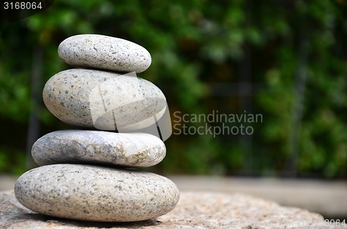 Image of Stack of zen rocks in garden