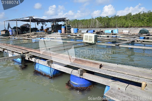 Image of Kelong, offshore platform, built predominantly with woodby fishe