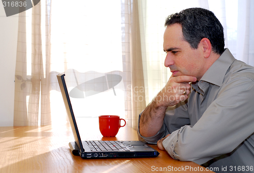 Image of Man with laptop