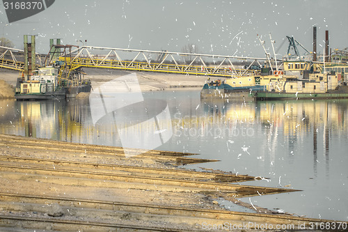 Image of Ships moored at a shipyard