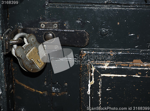 Image of historic jail cell door lock and shackle Kilmainham Jail Dublin 