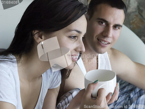 Image of couple relax and have fun in bed