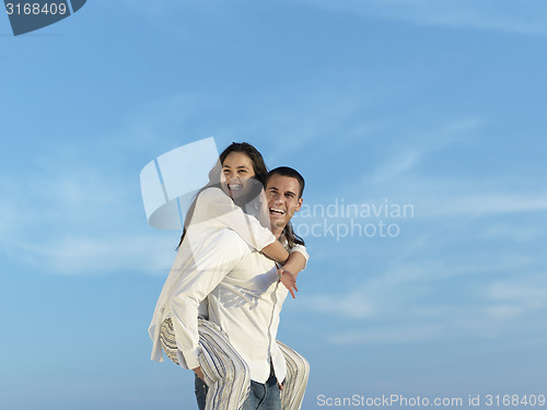 Image of happy young romantic couple have fun arelax  relax at home