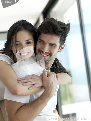 Image of relaxed young couple at home