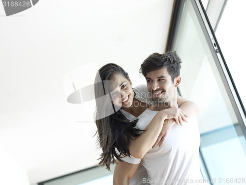 Image of relaxed young couple at home