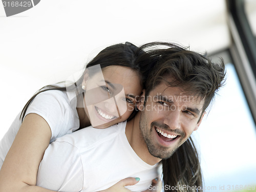 Image of relaxed young couple at home