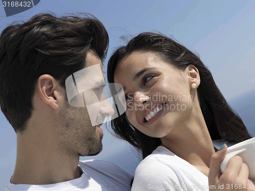 Image of relaxed young couple at home