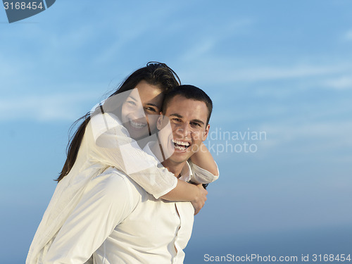 Image of happy young romantic couple have fun arelax  relax at home