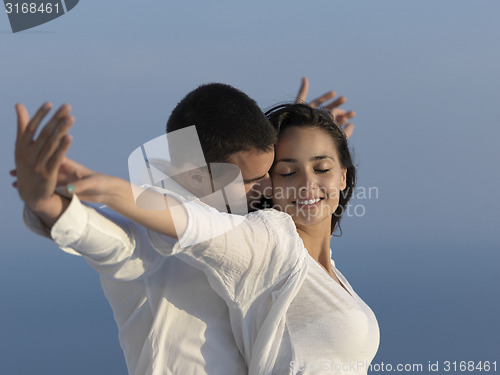 Image of happy young romantic couple have fun arelax  relax at home