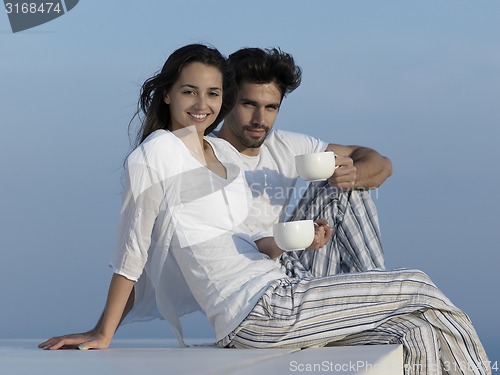 Image of happy young romantic couple have fun arelax  relax at home