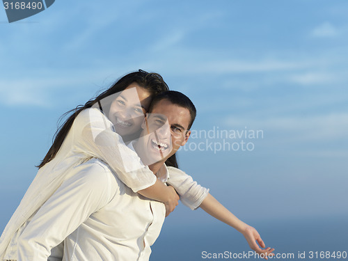 Image of happy young romantic couple have fun arelax  relax at home