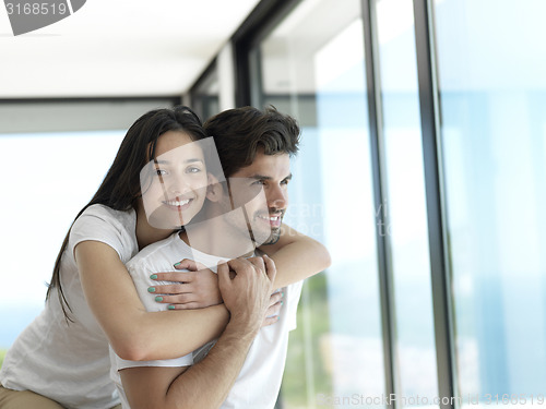 Image of relaxed young couple at home