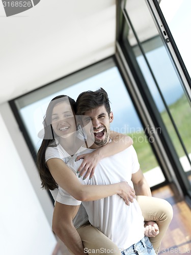 Image of relaxed young couple at home