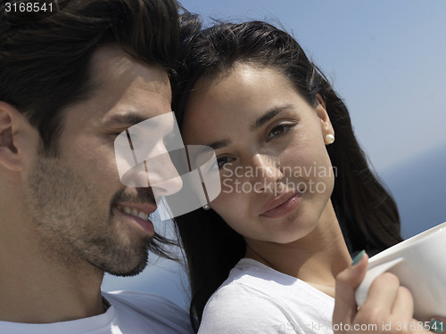 Image of happy young romantic couple have fun arelax  relax at home