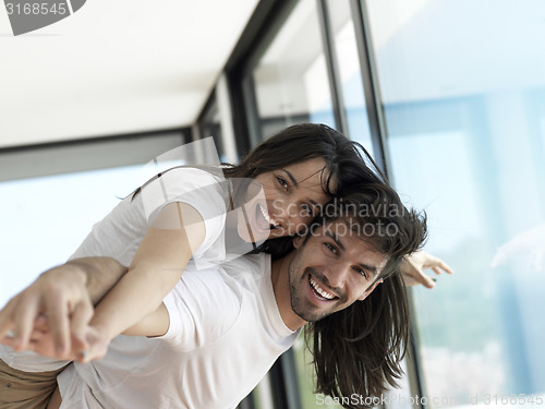 Image of relaxed young couple at home
