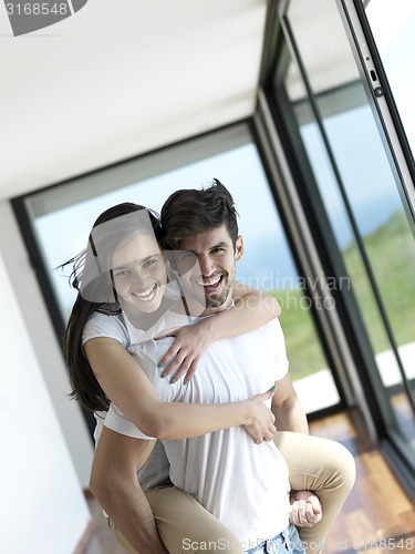 Image of relaxed young couple at home
