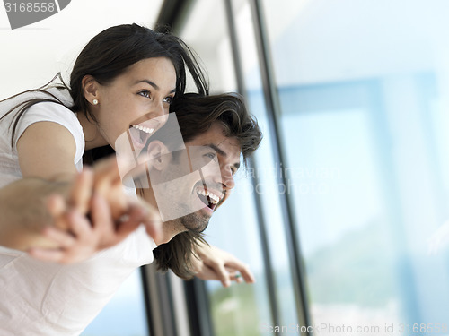 Image of relaxed young couple at home