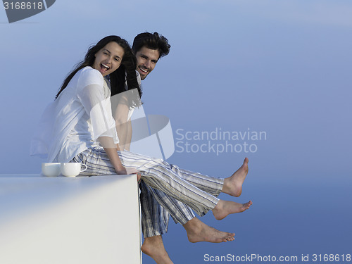 Image of happy young romantic couple have fun arelax  relax at home