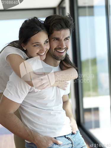 Image of relaxed young couple at home
