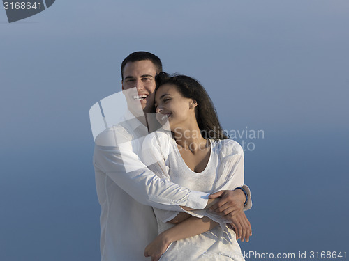 Image of happy young romantic couple have fun arelax  relax at home