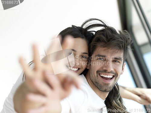 Image of relaxed young couple at home