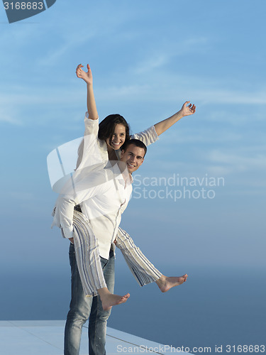 Image of happy young romantic couple have fun arelax  relax at home